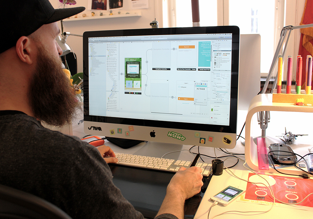 a designer working with Xcode Storyboards